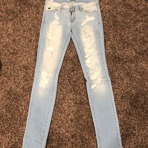 Light wash distressed skinny jeans